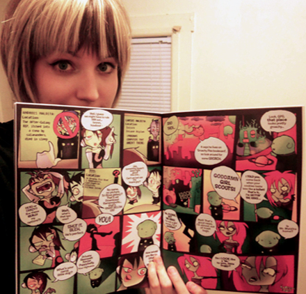 Hannah Stephey holding her comic