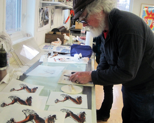 McCloskey making prints of St. Francis. photo: E. Cunfer