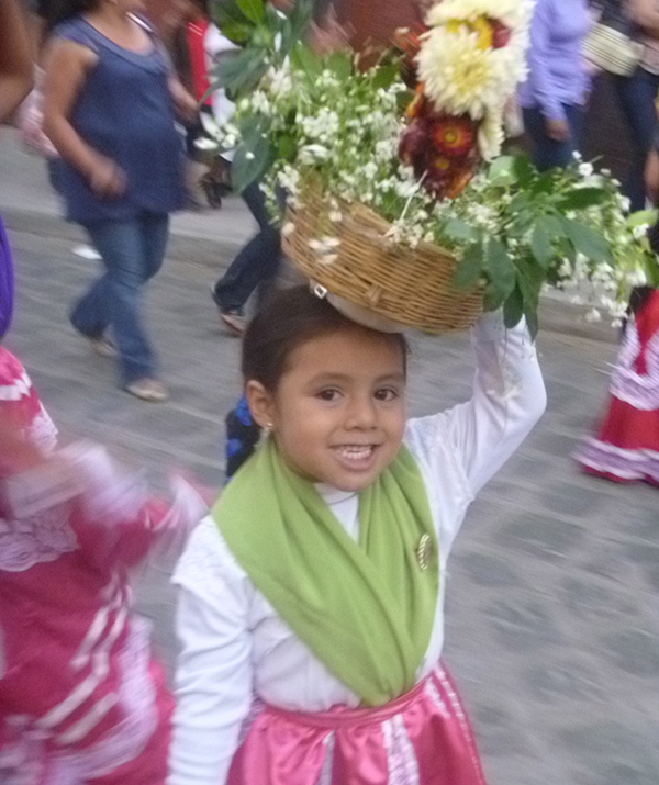 Young girl in one of Oaxaca's many parades. photo ©K.McCloskey 2012