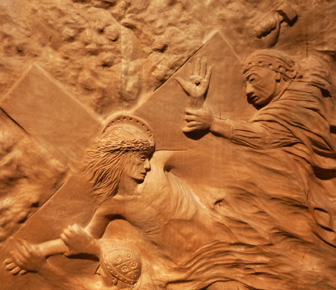 11. Jesus is nailed to the cross. (detail)